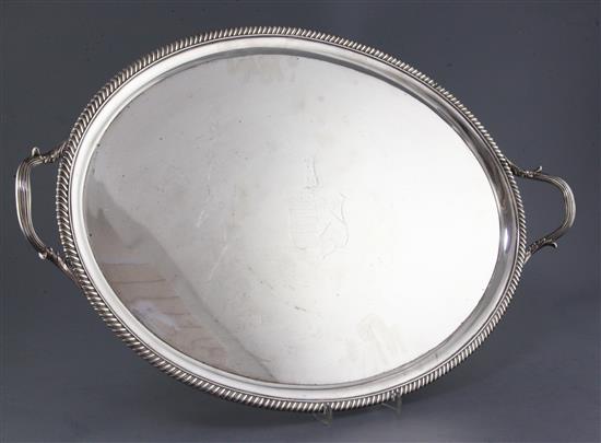 A George III silver oval two handled tea tray by Robert Garrard, 110 oz.